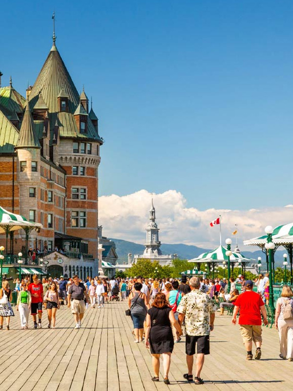 many people walking down a street in Canada